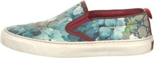 Gucci Slip-On Sneakers Neutrals GG Canvas & Blooms Print Rubber Trim Round-Toes Includes Box & Dust Bag Size not listed, estimated from measurements. Designer