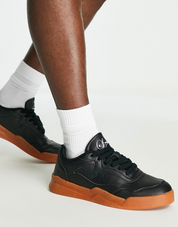 black gum sole trainers