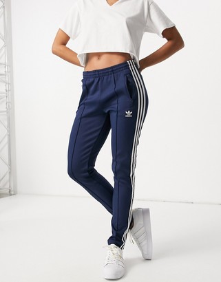 adidas originals adicolor logo track pants in baby blue