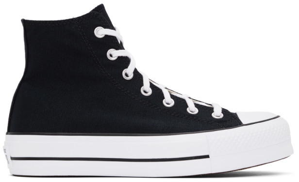 white leather converse with black stripe
