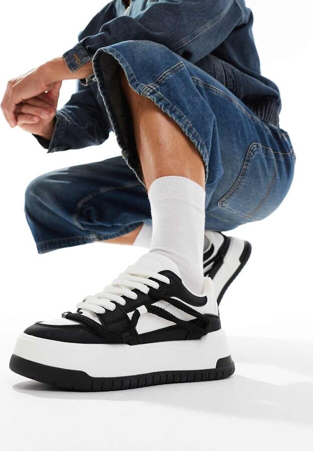 ASOS DESIGN chunky trainers in black and white with rope detail