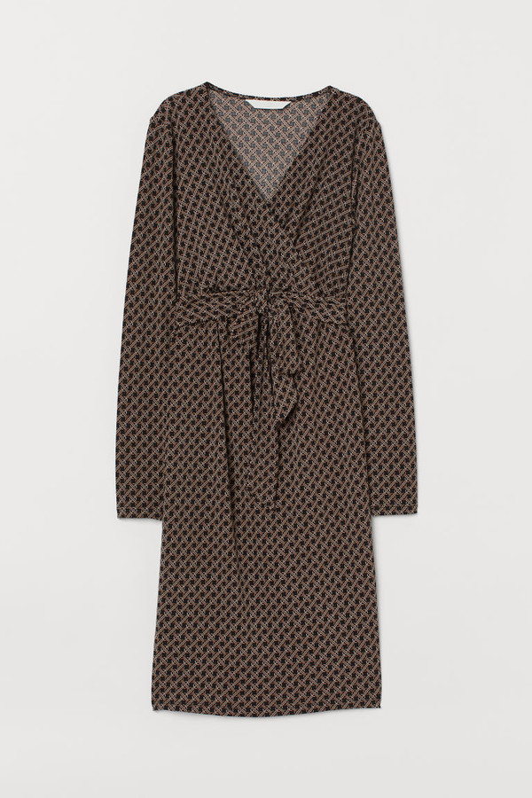 black dress below knee with sleeves