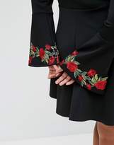 Thumbnail for your product : Club L Plus V Plunge Embroidered Skater Dress With Red Floral Trims & Long Sleeve.