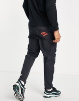 Thumbnail for your product : Nike Sport Essentials Multi Futura logo woven cargo pants in black
