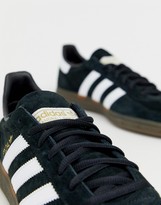 Thumbnail for your product : adidas handball spezial sneakers in black with gum sole