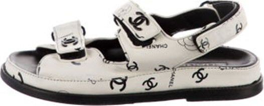 Chanel Lambskin Slingback Sandals From the 2022 Collection by Virginie Viard White Interlocking CC Logo & Camellia Accent Velcro Closure at Uppers Designer