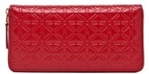 Thumbnail for your product : Comme des Garcons Star Embossed Long Wallet in Warm Tones
