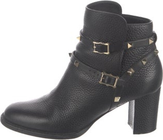 Valentino Leather Ankle Moto Boots Black Rockstud Accents Round-Toes with Studded Accents Wrap-Around Straps & Buckle Closure at Sides