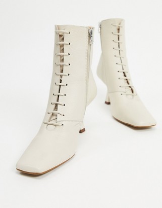 CHIO Exclusive lace up heeled ankle boots in ivory leather