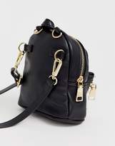 Thumbnail for your product : Steve Madden Bbruno black studded backpack with dual use cross body strap