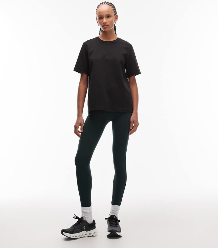 Arket seamless gym leggings with side pockets in dark green