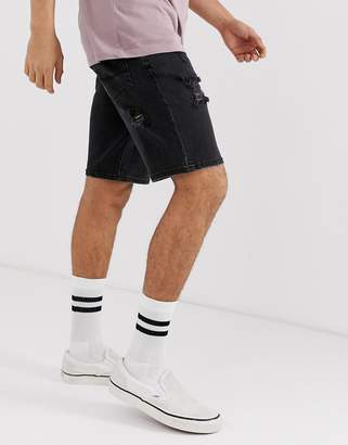 ASOS Design DESIGN denim shorts in slim washed black with heavy rips