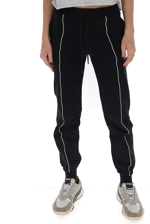 MSGM embossed logo joggers - ShopStyle Activewear Pants