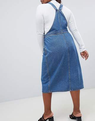 ASOS DESIGN Curve denim midi overall dress in midwash blue