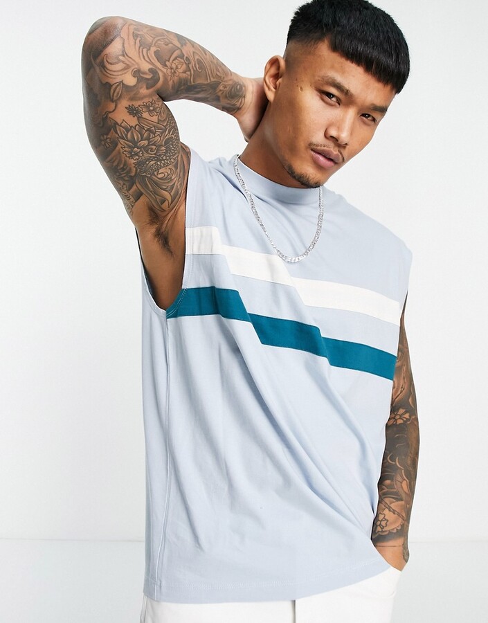 ASOS DESIGN oversized tank top in blue with chest stripes - ShopStyle Shirts