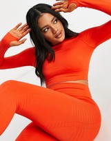 Thumbnail for your product : South Beach seamless fishnet long sleeve crop top in red