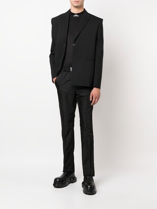 Givenchy 4G buckle slim-fit trousers