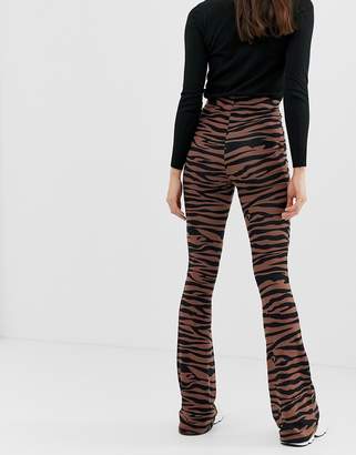 ASOS Tall DESIGN Tall flare leggings in dark tiger print-Multi