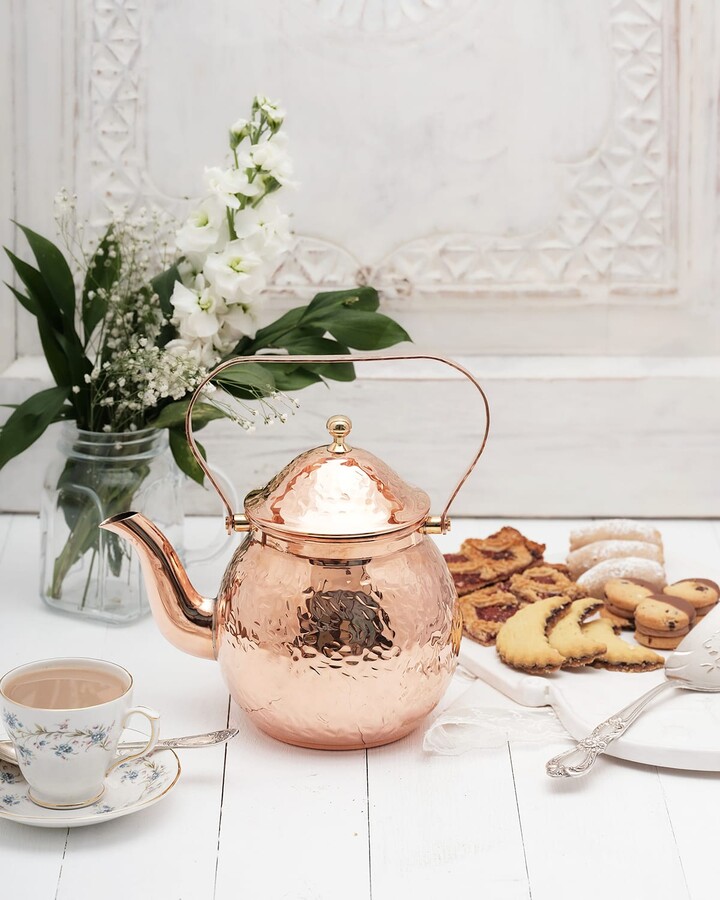 https://img.shopstyle-cdn.com/sim/0f/37/0f37fd5019464984b566719c3b38a076_best/coppermill-kitchen-vintage-inspired-copper-hand-hammered-teapot.jpg