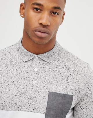 ASOS DESIGN long sleeve polo shirt with contrast yoke and pocket in interest fabric in white