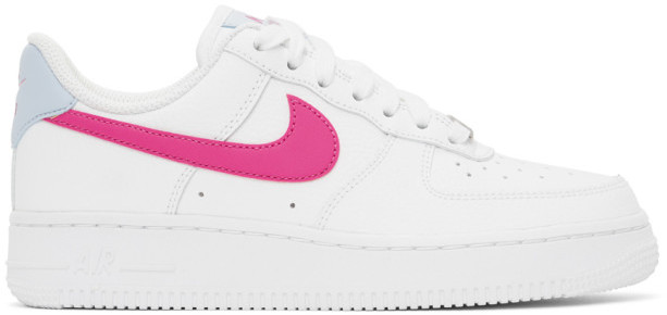 white nike shoes with pink swoosh