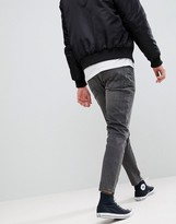 Thumbnail for your product : ASOS DESIGN tapered jeans in vintage washed black