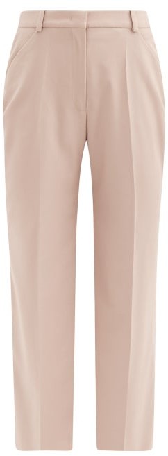 flared beige trousers