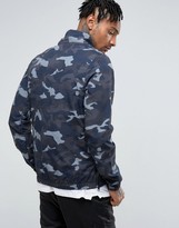 Thumbnail for your product : Ellesse Overhead Jacket In Navy Camo Print