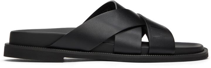 Valentino Garavani Black Calfskin 'VLTN' Slides - ShopStyle Sandals