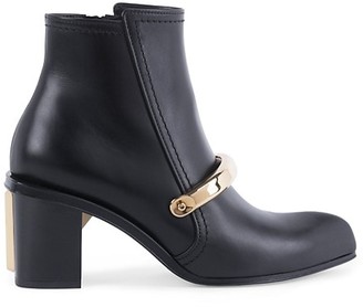 black boots with gold hardware