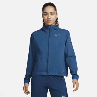 Nike Women's Impossibly Light Hooded Running Jacket in Blue - ShopStyle