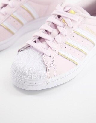 adidas Superstar sneakers in pale pink - ShopStyle Trainers & Athletic Shoes