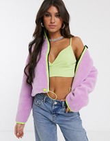 Thumbnail for your product : ASOS Design DESIGN cropped fleece jacket with neon binding-Green