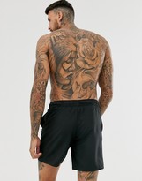 Thumbnail for your product : ASOS DESIGN cargo swim shorts in black