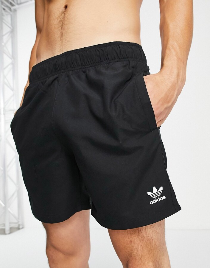 adidas essentials swim shorts in black - ShopStyle