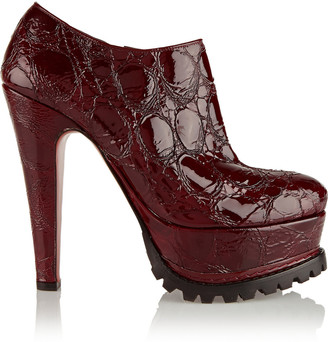 Alaia sold out Croc-effect patent leather ankle boots