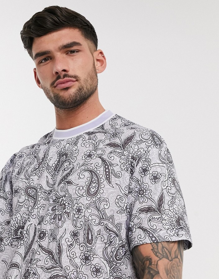 ASOS DESIGN relaxed longline t-shirt with all over floral and paisley print  in lilac linen look - ShopStyle