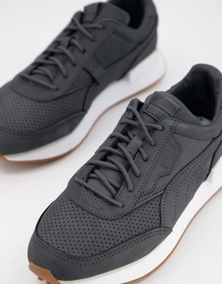 Puma future rider premium sneakers in black with gum sole Clearance