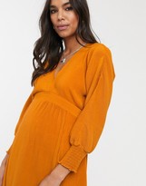 Thumbnail for your product : ASOS Maternity DESIGN Maternity long sleeve shirred waist maxi dress in rib in orange