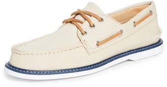 white canvas boat shoes