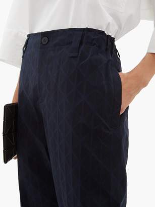 Issey Miyake Blink Geometric-print Pleated Trousers - Womens - Navy