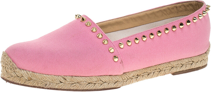 pink spiked loafers