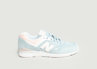 new balance 697 trainers in navy and silver