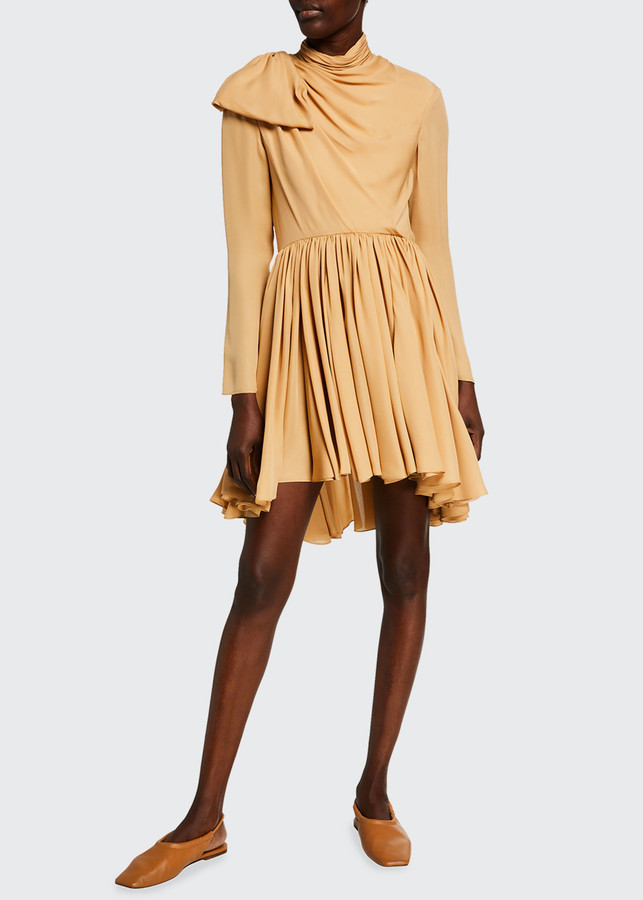 dress with bow at neck