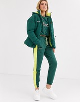 Thumbnail for your product : Ellesse oversized padded jacket with chest logo and contrast neon lining