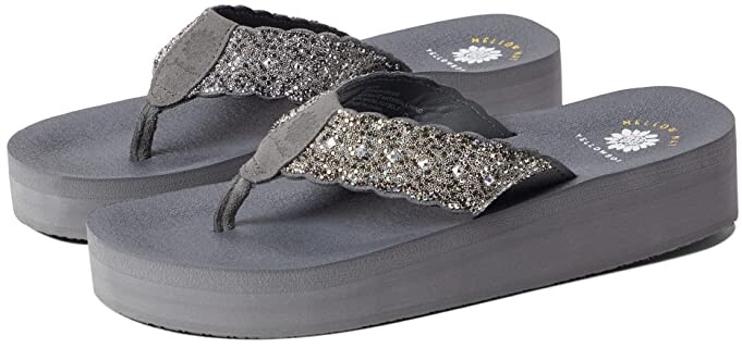 yellow box gray flip flops
