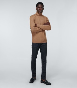 Saint Laurent Skinny-fit coated jeans