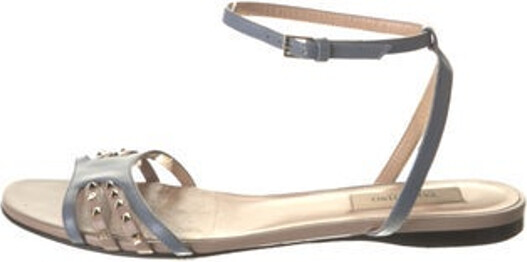 Valentino Leather Sandals Blue Rockstud Accents Studded & Cutout Accents Wrap-Around Straps & Buckle Closure at Ankles Includes Box & Dust Bag Unfortunately, due to restrictions, this item may not be eligible for shipping in all areas.