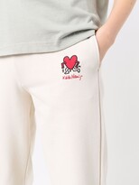 Thumbnail for your product : Axel Arigato Keith Haring-embroidered track pants