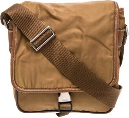 Prada Shoulder Bag Nero Tessuto Tessuto Nylon & Enameled Metal Triangle Silver-Tone Hardware Leather Trim Single Adjustable Shoulder Strap Leather Trim Embellishment & Dual Exterior Pockets Logo Jacquard Lining Buckle Closure at Front